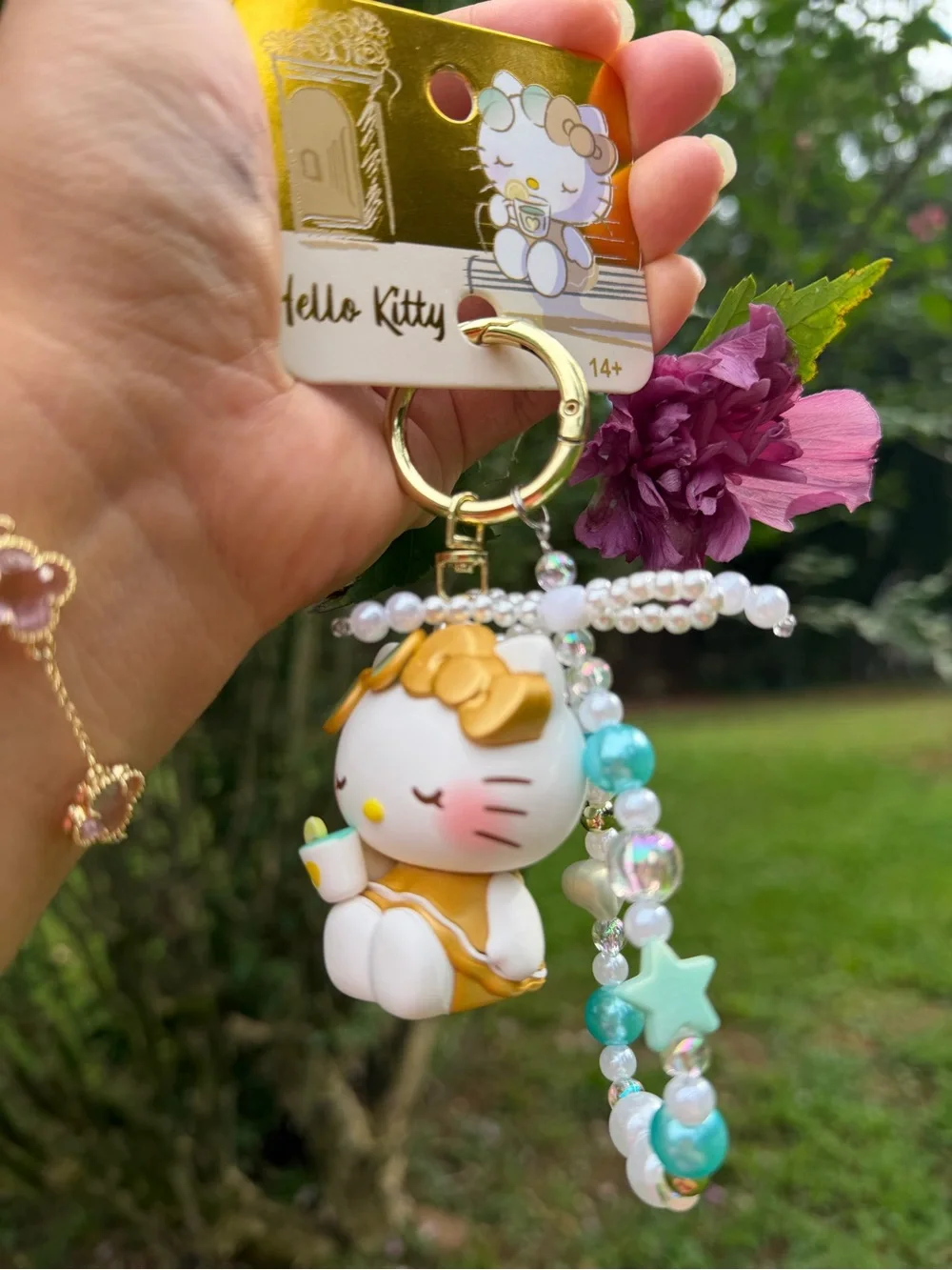 Sanrio Hello Kitty White, Gold & Turquoise Beaded Keychain Charm